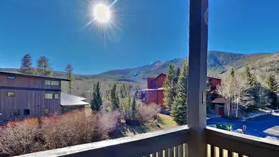 a view of the mountains from a balcony at Mountain Side D277 in Frisco