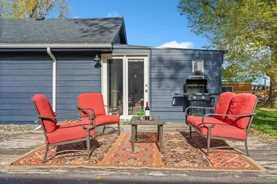 a group of chairs and a table on a patio at Sunset Haven Dog-friendly Home Near Trails and Lake in Fort Collins
