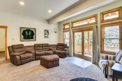 a living room with a couch and chairs at Mtn-View Cabin with Private Hot Tub in Georgetown! in Georgetown