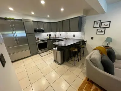 a kitchen with a couch and a table in a room at Blue Bear - Perfect Mountain Getaway in Idaho Springs