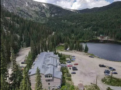 an aerial view of a building next to a lake at Blue Bear - Perfect Mountain Getaway in Idaho Springs