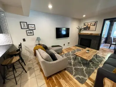 a living room with a couch and a fireplace at Blue Bear - Perfect Mountain Getaway in Idaho Springs