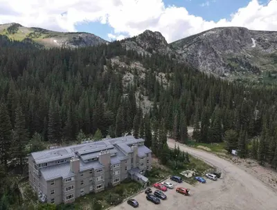 an aerial view of a building in the mountains at Blue Owl - Tree House Views! Couples Getaway! in Idaho Springs