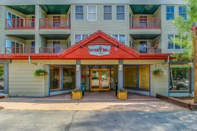an apartment building with a red roof at Silvermill Lodge 8285 in Keystone