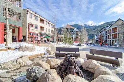a group of benches and rocks in a town at Silvermill Lodge 8295 in Keystone