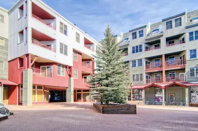 a christmas tree in front of a building at Silvermill Lodge 8295 in Keystone