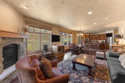 a living room with a couch and a fireplace at Lone Eagle 3016 in Keystone