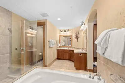 a large bathroom with a tub and a shower at Lone Eagle 3016 in Keystone