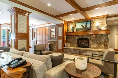 a living room with a couch and a fireplace at Lone Eagle 3016 in Keystone