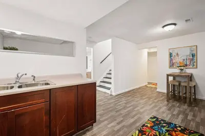 a kitchen with a sink and a counter top at Spacious SIX Bedroom, Great Location in Longmont