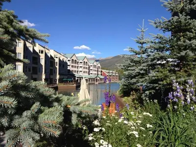 a view of a town with a pond and buildings at Brightwood 107 in Keystone