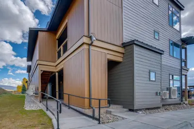 a modern house with a brown and gray facade at Walk to Ski Shuttles and Stores! Modern Frisco Unit in Frisco