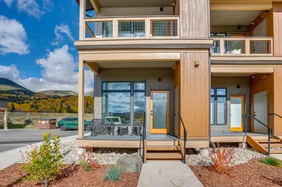 a house with glass doors and a porch at Walk to Ski Shuttles and Stores! Modern Frisco Unit in Frisco