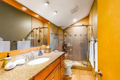 a bathroom with a sink and a toilet and a shower at Timber Ridge 91226 in Silverthorne