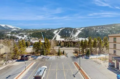 an aerial view of a parking lot with a mountain at Oro Grande 414 in Keystone