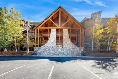 a building with a parking lot in front of it at Tenderfoot Lodge 2663 in Keystone