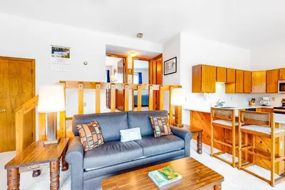 a living room with a couch and a table at Buffalo Ridge C102 in Silverthorne