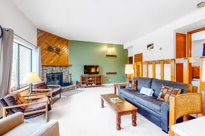 a living room with a couch and a fireplace at Buffalo Ridge C102 in Silverthorne