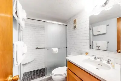 a bathroom with a sink and a toilet at Buffalo Ridge C102 in Silverthorne