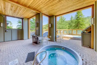 a jacuzzi tub in the middle of a house at Buffalo Lodge 8372 in Keystone