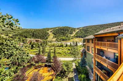 an aerial view of a resort with mountains in the background at Tenderfoot Lodge 2664 in Keystone