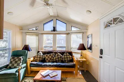a living room with a couch and a window at #84 Tiger Run in Breckenridge