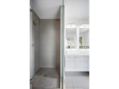 a bathroom with a shower and a sink at The Sage Sanctuary in Denver