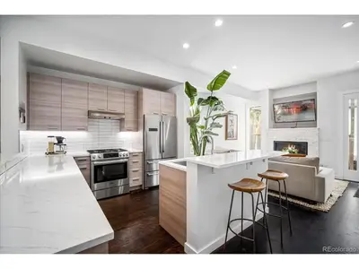 a kitchen with white counters and a white counter top at The Sage Sanctuary in Denver