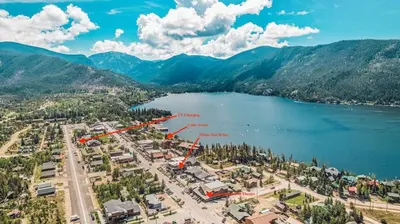 an aerial view of a town next to a lake at Stylish Grand Lake Retreat - King Bed - Walk to Lake in Grand Lake