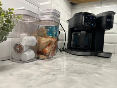 a coffeemaker and a coffee maker on a counter at UPTOWN CASTLE - CITY VIEWS - THEATER & CONVENTION DISTRICT! in Denver