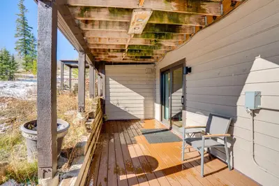 a porch of a house with a chair on it at Multi-Level Haven 3 Mi to Lake Dillon in Silverthorne