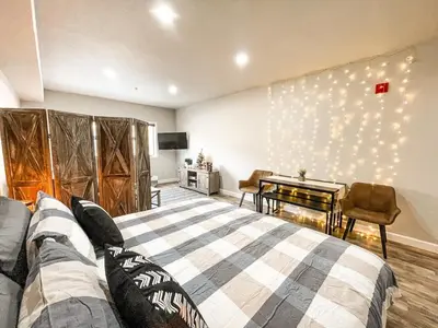 a bedroom with a bed and a table and a piano at #5075 Keystone in Keystone