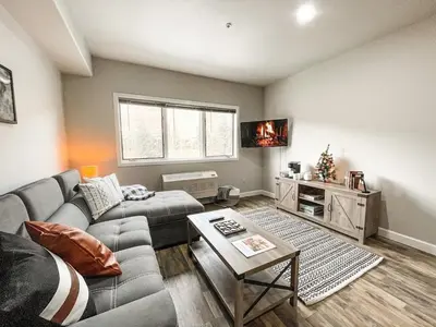 a living room with a couch and a table at #5075 Keystone in Keystone