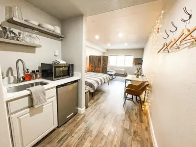 a kitchen and a bedroom with a bed in a room at #5075 Keystone in Keystone