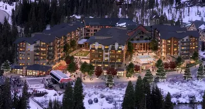 a resort in the middle of a snow covered mountain at Kindred Resort Luxury Ski In, Ski Out 1 Bedroom Residence At The River Run Gondola in Dillon