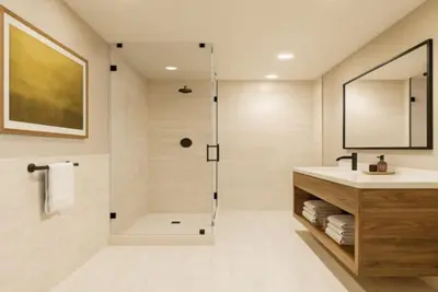 a bathroom with a shower and a sink at Kindred Resort Luxury Ski In, Ski Out 1 Bedroom Residence At The River Run Gondola in Dillon