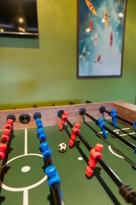 a game of soccer on a trampoline at Game Room Paradise, Firepit & Outdoor Movies in Arvada