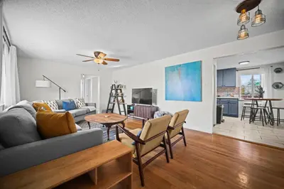 a living room with a couch and a table at Family Home - Dog-Friendly - Fire Pit in Arvada