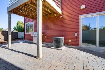 a red house with a red wall with a heater at Near Denver airport 20 min away from downtown in DEN