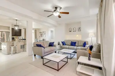 a living room with a couch and a table at Near Denver airport 20 min away from downtown in DEN