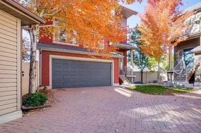 a brick driveway in front of a house with a garage at Near Denver airport 20 min away from downtown in DEN