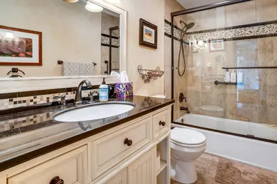 a bathroom with a sink and a toilet and a shower at 3 Mi to Dtwn Pet-Friendly Condo in Silverthone in Silverthorne