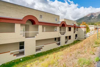 a row of apartment buildings on a hill at 3 Mi to Dtwn Pet-Friendly Condo in Silverthone in Silverthorne
