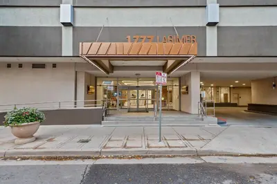 a building with a no parking sign in front of it at 1777 Larimer 910 in Denver