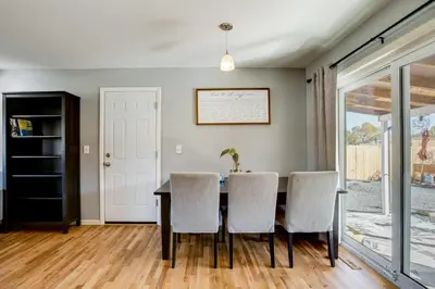 a dining room with a table and chairs at Furnished Patio! Suburban Gem 11 Mi to Dtwn Denver in Arvada