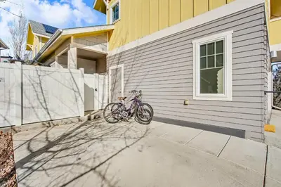 a bike parked on the side of a house at The Revive Loft with Balcony, Workspace and Bikes in Fort Collins