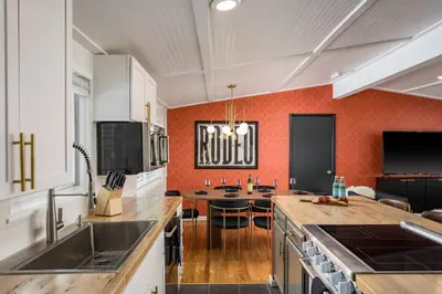 a kitchen with a sink and a counter top at The Wild Western - 5Bed, Hot Tub, Sauna, Mini Putt, Fire Pit in Denver