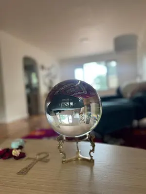 a glass ball on top of a table at Temple Of Divine Light in Boulder