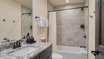a bathroom with a sink and a toilet and a shower at Fireplace Game Room Mountain Views Near Golf Dining Keystone River Run by AvantStay in Dillon