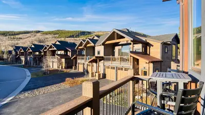 a view from the balcony of a house at Fireplace Game Room Mountain Views Near Golf Dining Keystone River Run by AvantStay in Dillon